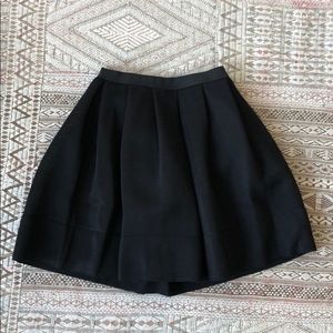 Black Sando pleated a-line skirt